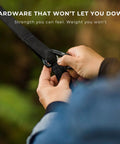 Person attaching 5kN carabiner to tree strap for All In One Camping Hammock Kit With Bug Net And Rain Fly For Easy Setup