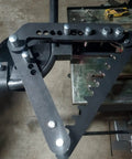 Close-up of Premium Black Oxide Steel Manual Tube And Pipe Bender For Round Square Stock showing adjustable handle and mount.