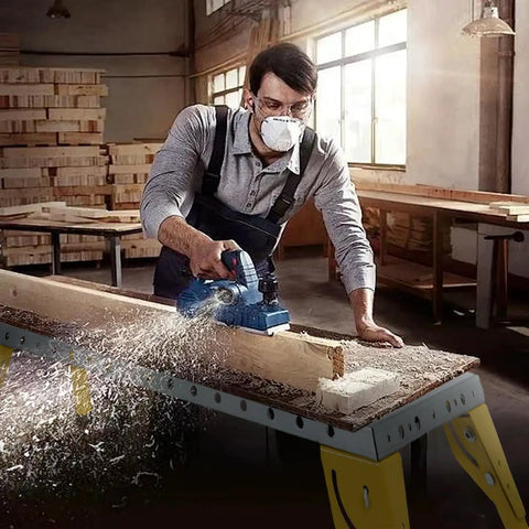 Hella Badass Portable Welding Table With Adjustable Height And Three Angle Positions Folding Workbench On Wheels being used for woodworking.