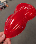 One Gallon Blood Red Automotive Basecoat Paint Ready To Spray With Slow Reducer displayed on a smooth surface.