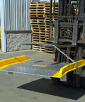 Heavy Duty Aluminum Dock Board Workhorse 60 By 48 Inch 15000 Lb Capacity Forklift Trailer Ramp For Warehouses, shown attached to a forklift.