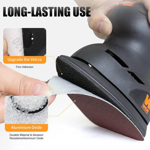 Close-up of sanding pad installation using 156Pcs Oscillating Multi Tool Sanding Pads Kit with triangle and finger pads.