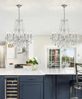Mini Crystal Chandelier With K9 Crystals, Chrome Finish, 5 E12 Bulbs in a modern kitchen setting, adjustable hanging
