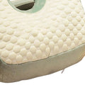Close-up of Cool Ice Silk Napping Face Pillow For Table Naps, showing green ergonomic design and breathable texture.