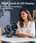 Woman adjusting Rechargeable Clip On Fan 4000mAh With 100 Speed Touch Control LED Display 360 Degree Rotation on table