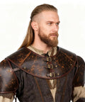 Man wearing Medieval Leather Pauldron Shoulder Armor For Viking Knight Cosplay Larp Ren Faire Costume Brown Faux Leather With Collar Buckle Durable Realistic Texture Totally Boss Quality