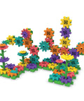 101 Piece Gear Building Set For Kids So They Can Build Twisting Gardens While Learning Cause Effect Sequencing And Early Engineering Hands On STEM Construction Toy Montessori Inspired Kid Friendly Fine Motor Play And Educational Engineering Gift, colorful gears assembled in a twisting garden display.