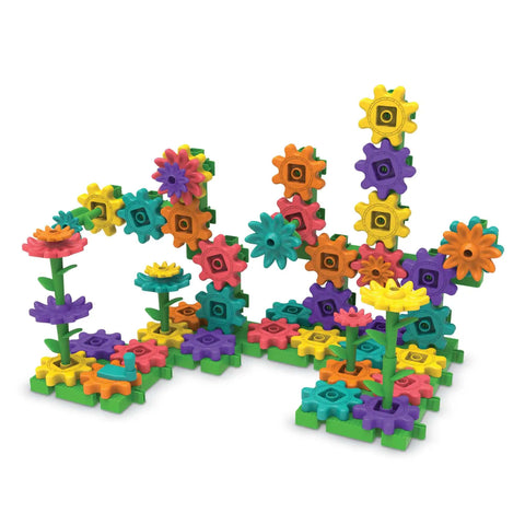 101 Piece Gear Building Set For Kids So They Can Build Twisting Gardens While Learning Cause Effect Sequencing And Early Engineering Hands On STEM Construction Toy Montessori Inspired Kid Friendly Fine Motor Play And Educational Engineering Gift, colorful gears assembled in a twisting garden display.