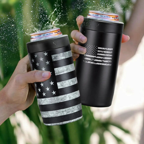 4 In 1 Slim Can Cooler Insulated Stainless Steel Holder Fits 12 Oz Cans Regular Cans Beer Bottles And Drinking Cup Double Wall Keeps Drinks Icy Cold Black American Flag design shown outdoors with hands holding two coolers, cans visible