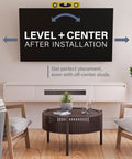 Heavy Duty Tilting TV Wall Mount For Big Screens Up To 90 Inches And 150 Pounds With Integrated Wire Management and No Sweat Assembly in a living room.