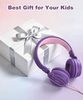 On Ear Kids Headphones With Microphone, Wired, 93dB Volume Limited, Foldable Lightweight Headphones For School Learning And Entertainment, Pink Purple next to gift box