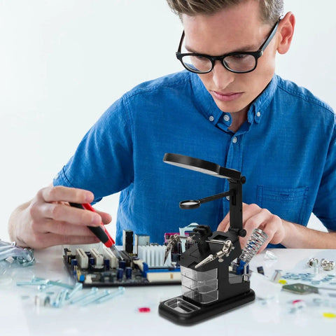 Person using USB Electric Soldering Clamp With 10 LED Magnifying Desk Lamp For Electronics Repair Adjustable Third Hand Tool