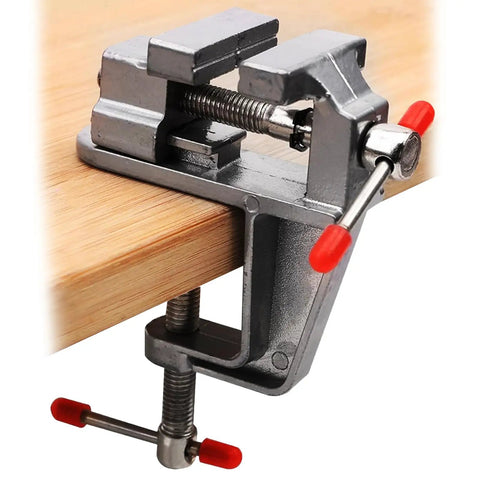 Compact Mini Hobby Vise For DIY Crafting And Jewelry Repair Handy Small Bench Clamp Multi Purpose Workbench Vise With Precision Gripping And Durable Steel Construction Ideal For Model Making Electronics And Repair Jobs clamped to a wooden edge
