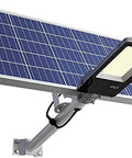 Badass Solar Security Flood Light With Remote Control And Dusk To Dawn Sensor, featuring large solar panel and durable build.