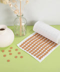 2000 Piece Self Adhesive Felt Furniture Pads 3 8 Inch Round Cabinet Door Bumpers on a green table with a vase.
