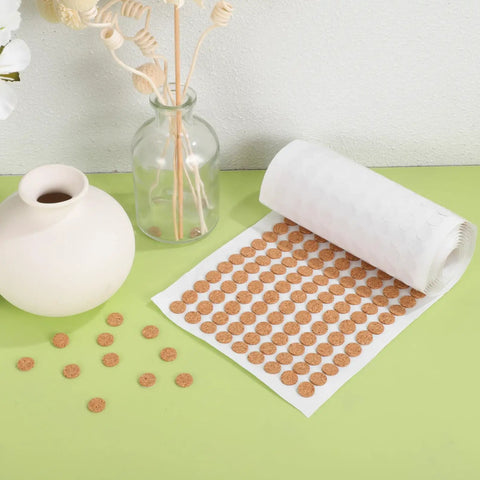 2000 Piece Self Adhesive Felt Furniture Pads 3 8 Inch Round Cabinet Door Bumpers on a green table with a vase.