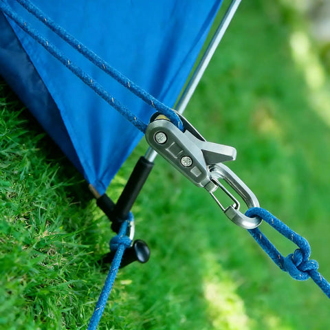 Close-up of Six Pack Metal Rope Adjusters With Rustproof Brass Cam Tensioners and 9 Foot Reflective Braided Cords securing a tent