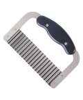 Stainless steel crinkle cutter for vegetables with black ergonomic handle, angled view.