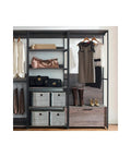 No-Fuss Heavy-Duty Modular Walk-In Closet Organizer Featuring Rustic Weathered Wood Panels Built For Hassle-Free Wardrobe Storage And Slick Layout Management with hanging clothes, bags, and storage bins.