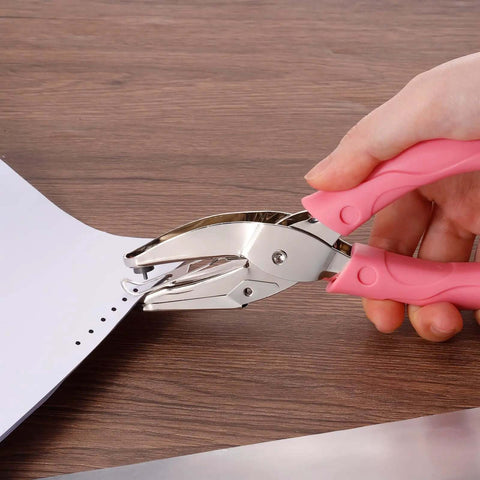 Pink 1/16 Inch Single Hole Punch Handy Handheld Paper Puncher with Soft Grip Ergonomic Design punching paper on a table.