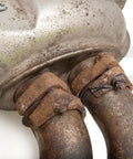 Rusted exhaust pipes showing corrosion on BMW E46 M3, illustrating need for Repair Replacements Fix Kit For Rusted And Corroded Exhaust Flanges