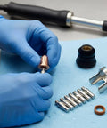 Pro Grade Torch Consumables Kit With Cutter Nozzles Electrodes Retaining Cap Insulating Cap And Washers, hand installing copper nozzle