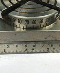 Close-up of the Beefy Three Inch Rotary Milling Table With M6 Clamp Kit showing indexing table with measurement scale and T-slots.