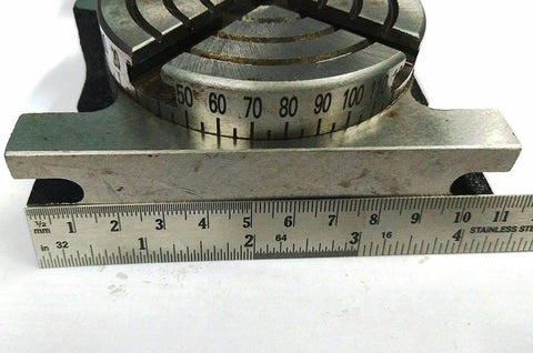 Close-up of the Beefy Three Inch Rotary Milling Table With M6 Clamp Kit showing indexing table with measurement scale and T-slots.