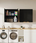 Slick Fluted Black Bathroom Wall Cabinet With Two Doors above washer and dryer setup in laundry room, doors open revealing shelves.