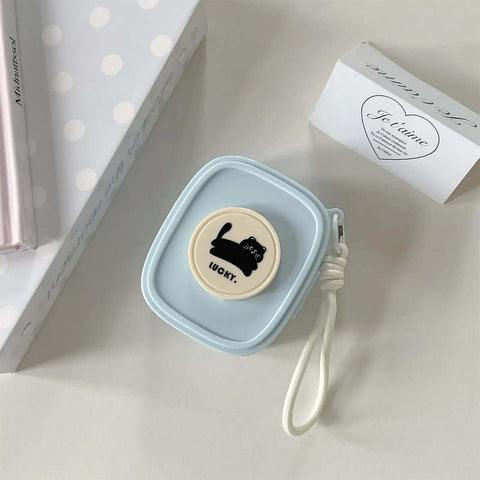 Badass Hella Tough Shockproof EDC Case For Bluetooth Headphones in light blue with cat design and clip, ideal for organizing small items.