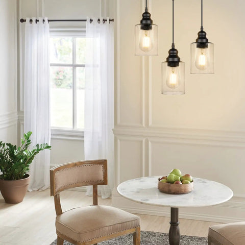 Dining room with 3 pack industrial pendant lights with seeded glass shades, black farmhouse ceiling lighting for modern decor