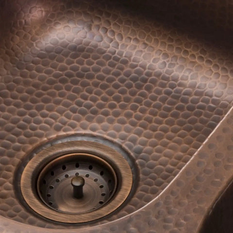Low Profile Kitchen Sink Basket Strainer Drain in Antique Copper in 4.5 inch sink, close-up showing textured finish