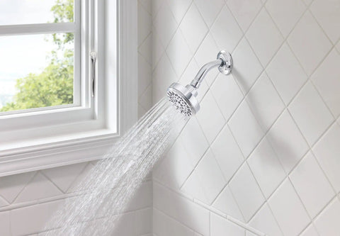 Ignite Chrome Five Function Shower Head With 2.5 GPM High Pressure Spray in a modern bathroom setting