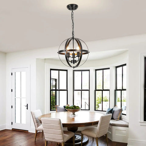 Three Light Vintage Pendant Chandelier In Matte Black With Spherical Shades in dining room