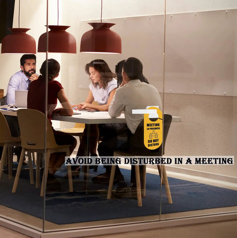 Office meeting room with Double-Sided Meeting In Progress Door Sign Pack Of 2 Do Not Disturb And Available Signs visible in use