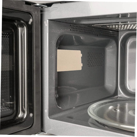 Inside view of microwave with Ten Piece Microwave Cover And Waveguide Mica Sheets Set For Oven Cavity Insulation And Heat Resistance installed.