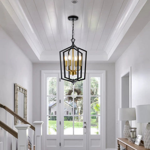 Four Light Dining Room Pendant Light Fixture Over Table Dope Black Farmhouse Chandelier Metal Modern Style for Kitchen Island Living Room Foyer and Entryway Brushed Brass Finish hanging in an entryway.
