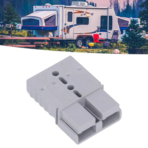 Heavy Duty Quick Connect Battery Power Plug Hella Tough 120 Amp 600 Volt Disconnector With Flame Retardant Housing For Trucks Winches And Electric Vehicles Comes In A Two Pack, gray connector against camping backdrop.