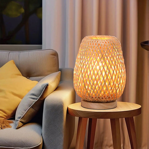 Vintage Dope Gold Industrial Table Lamp With Rustic Metal Cage Shade on side table next to sofa in living room, warm glow