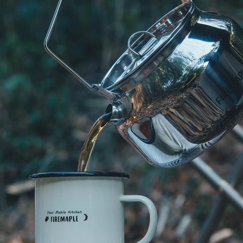 Open Fire Camping Kettle 1.2L Lightweight Stainless Steel Tea Pot pouring into mug