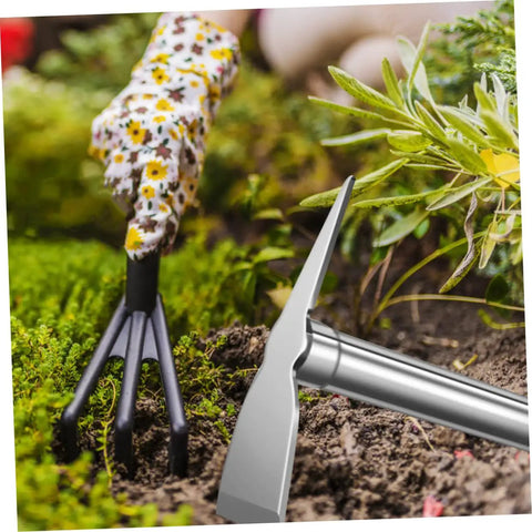 Rustproof Stainless Steel Garden Hoe Handheld Weeding Tool With Ergonomic Grip in use among green plants and soil