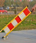 Built Like A Tank Retractable Traffic Barricade Featuring Smooth Glide Pulleys And A Quick Fold Stand for easy crowd control setup.