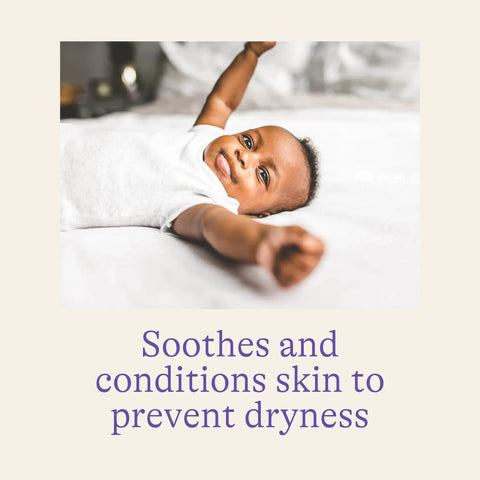 Happy baby stretching on bed, illustrating comfort provided by Ultra Gentle Baby Wipes With Lanolin For Sensitive Skin Hypoallergenic And Lightly Scented Six Pack Of 480 Wipes Keeps Baby Fresh And Comfortable During Diaper Changes.