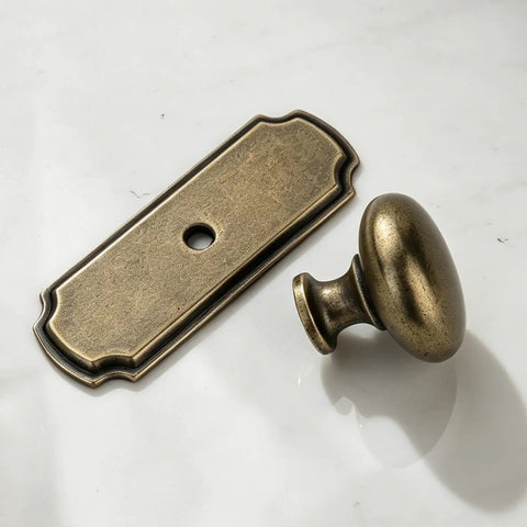 10 Pack 1 1/4 Inch Cabinet Knobs With Matching Backplates Antique Brass Vintage Drawer Pulls close-up of knob and plate