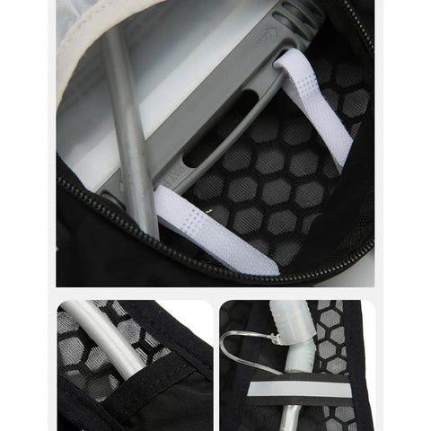 Interior view of Go To Hydration Vest for Runners and Hikers with Breathable Mesh, showing tube storage and mesh details.