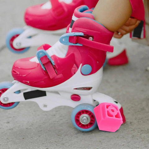 Close-up of kid's roller skate with Universal Skate Brake Block for roller skates and inline pads attached, showing strong stopping power.