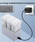 2-Pack Mini 3 Intelligent Flight Battery And 3-Channel Fast Charger Two-Way Charging Hub with batteries plugged in