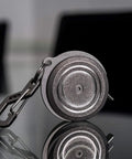Ultra Tiny Titanium Ti Tape Retractable Mini Tape Measure With 3 Feet Range, Imperial And Metric, stonewashed finish on keychain clip