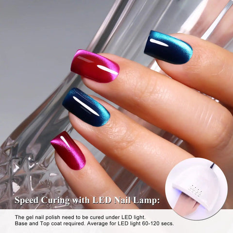 Manicured nails with Two Color Cat Eye Magnetic Gel Polish Set 10ml Each In Deep Teal Blue And Fuchsia Rose Red