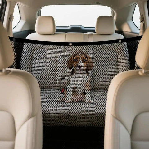 Rugged Dog Barrier Net Built Explicitly For Tesla Cybertruck Vehicles; mesh netting separates dog from front seats.